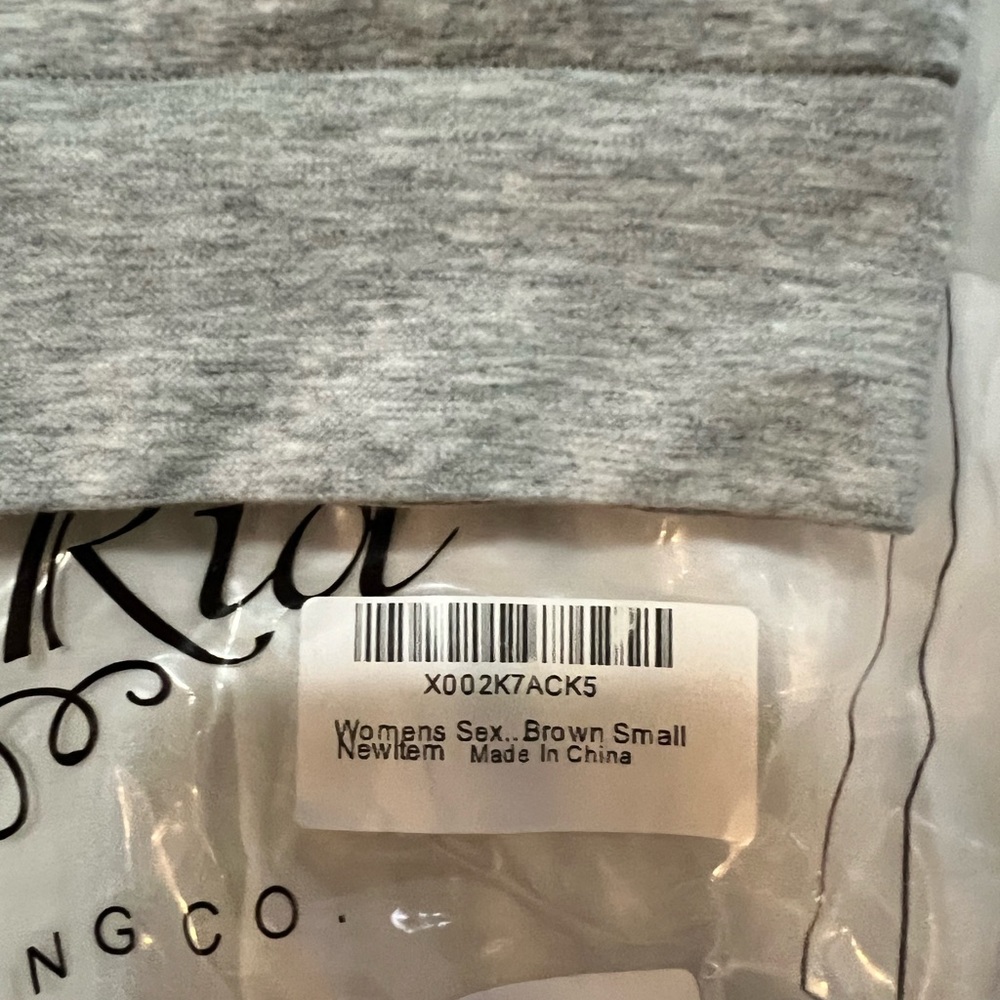 Brand new in bag sports bra. Very small, XS. Pre-teen size sports bra. Gray